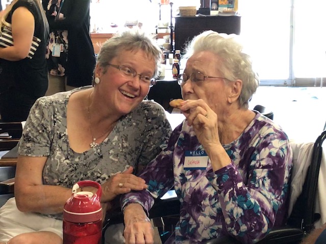 Two women sitting together