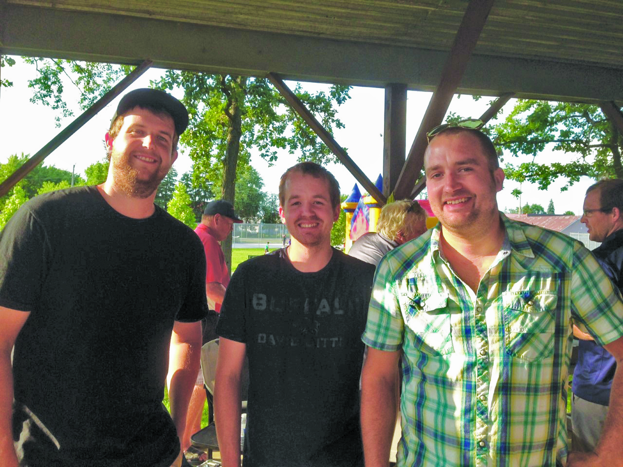 Featured image for Pork and corn roast raises $7K for refugees to come to HN