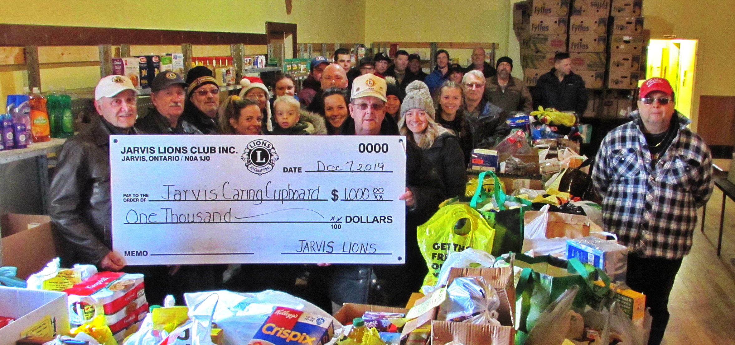 Featured image for Jarvis Lions hold food drive, donate $1,000 to food bank