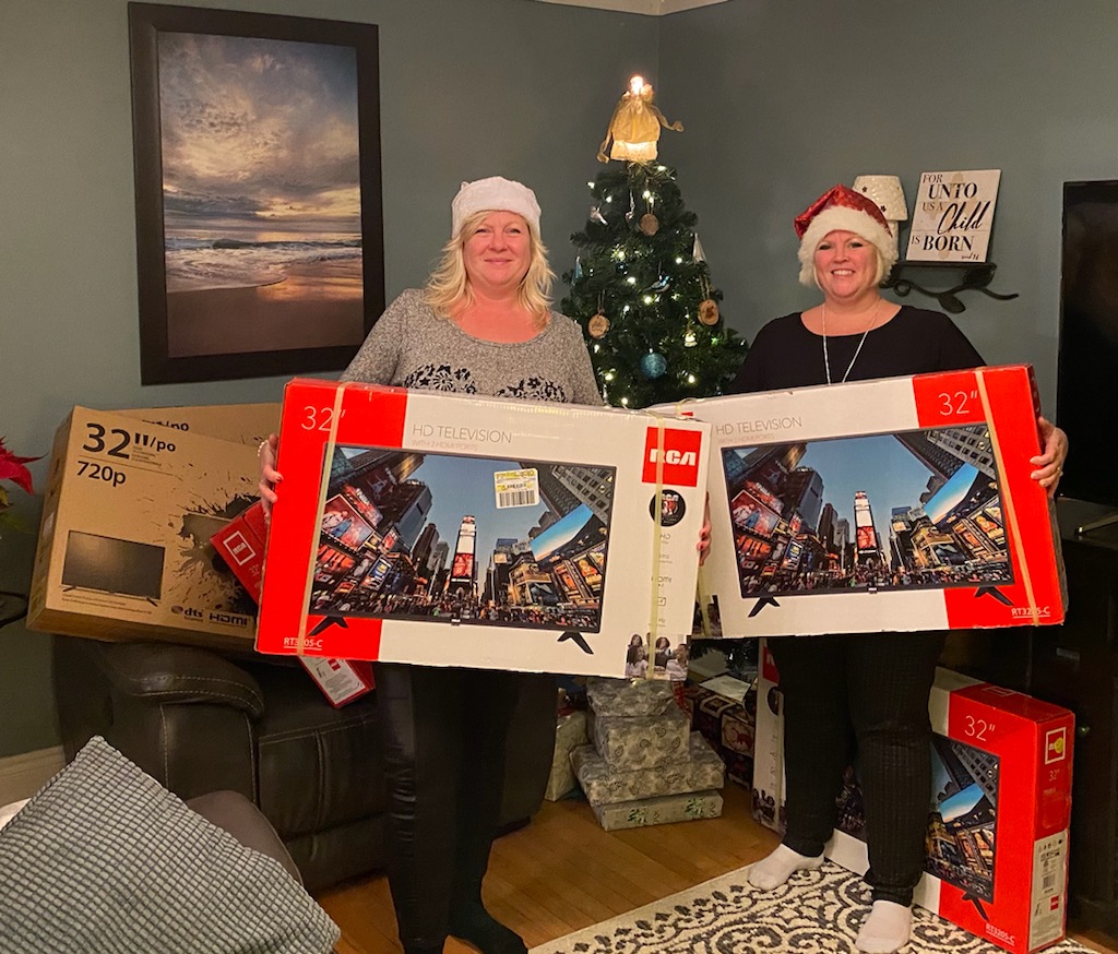 Featured image for Local realtors gather family and friends to donate televisions to local seniors in need of entertainment