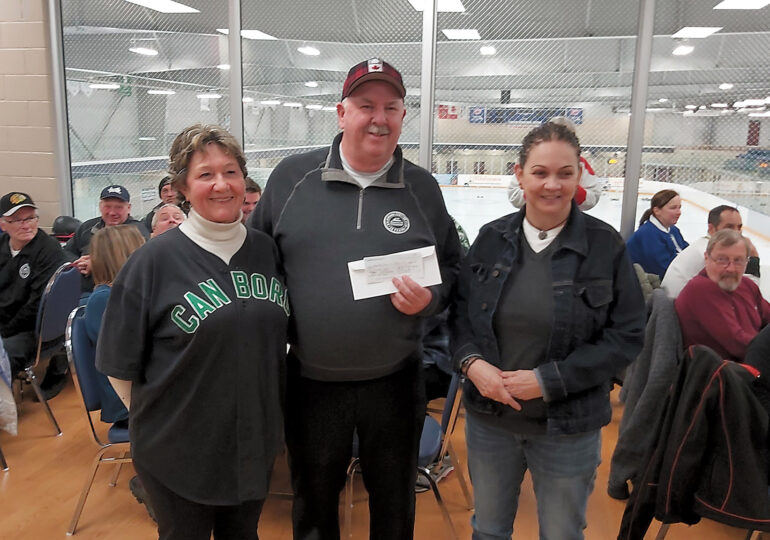 Curling Club donates over $900 to MICE+